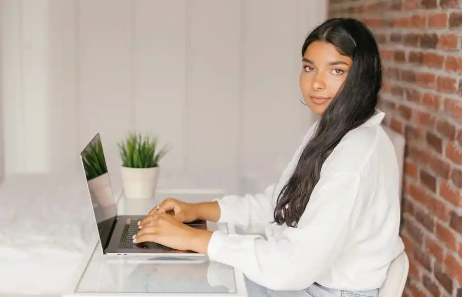 A student completing an application online