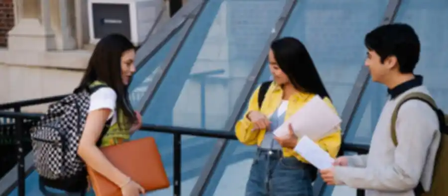Students talking outside on campus